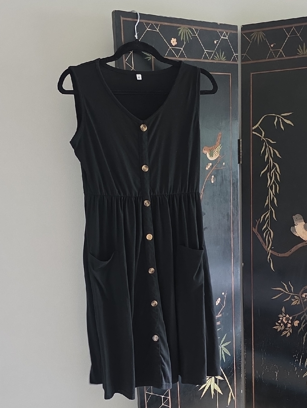 Sleeveless Black Button-Front Dress with Pockets